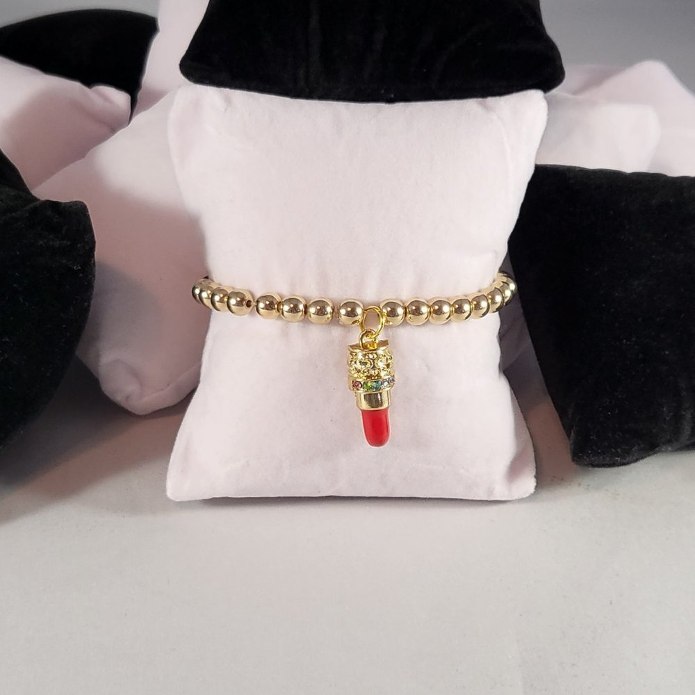 Red, Black, and Gold Beaded Bracelet by Natalie Queen Creations